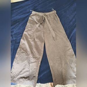 High waisted, wide leg, faux suede pants.